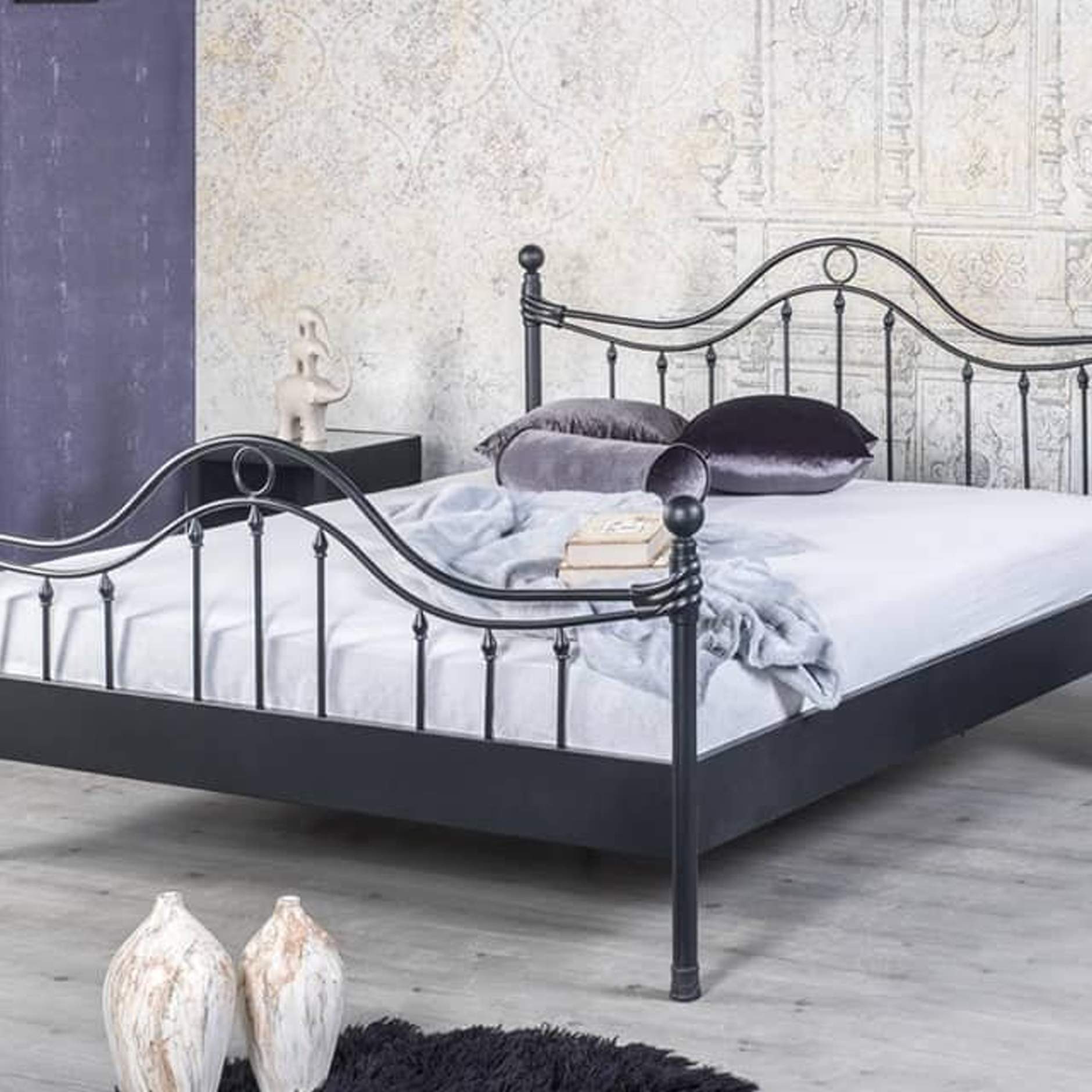 Zwart ijzeren bed